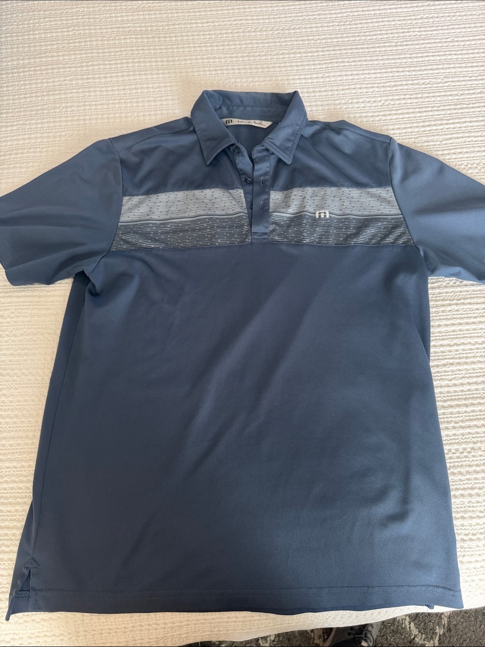 Travis Mathew Navy Blue Short-Sleeve Polo with Chest Stripe
